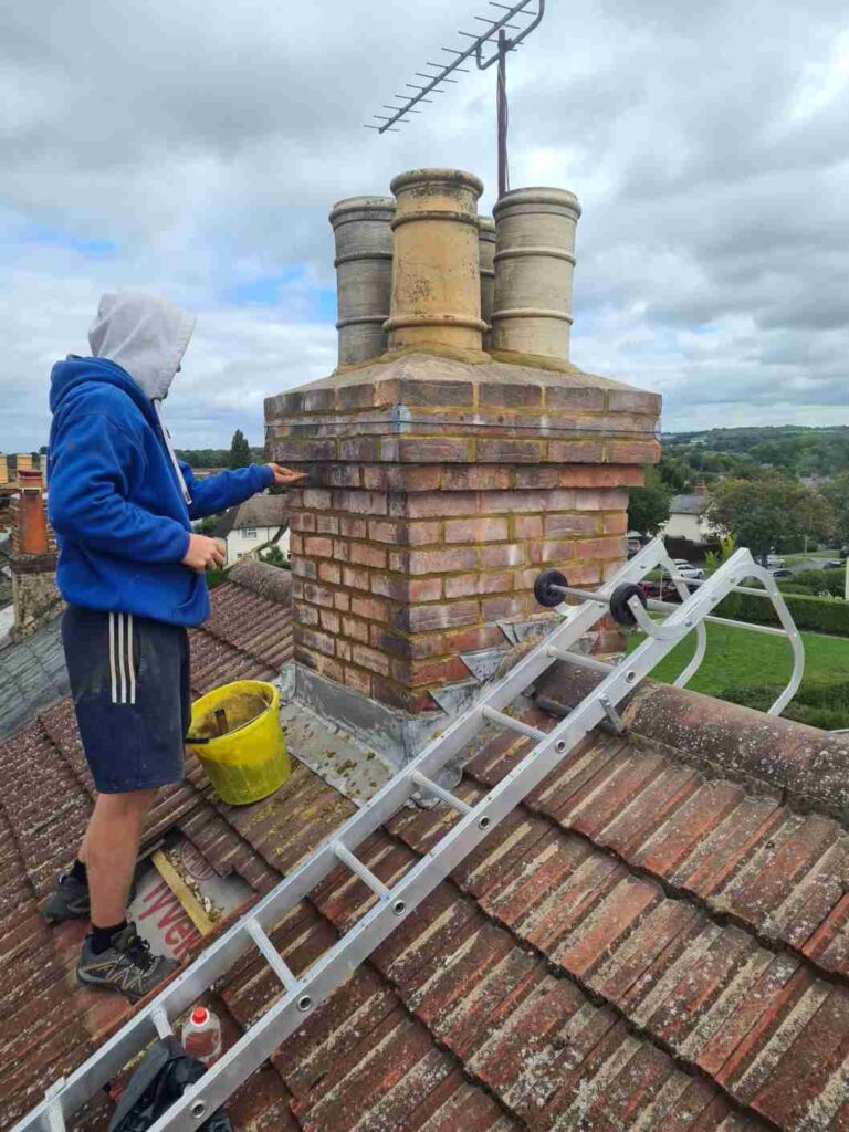 Roofing contractor repairing chimney stack in Kildare Ireland