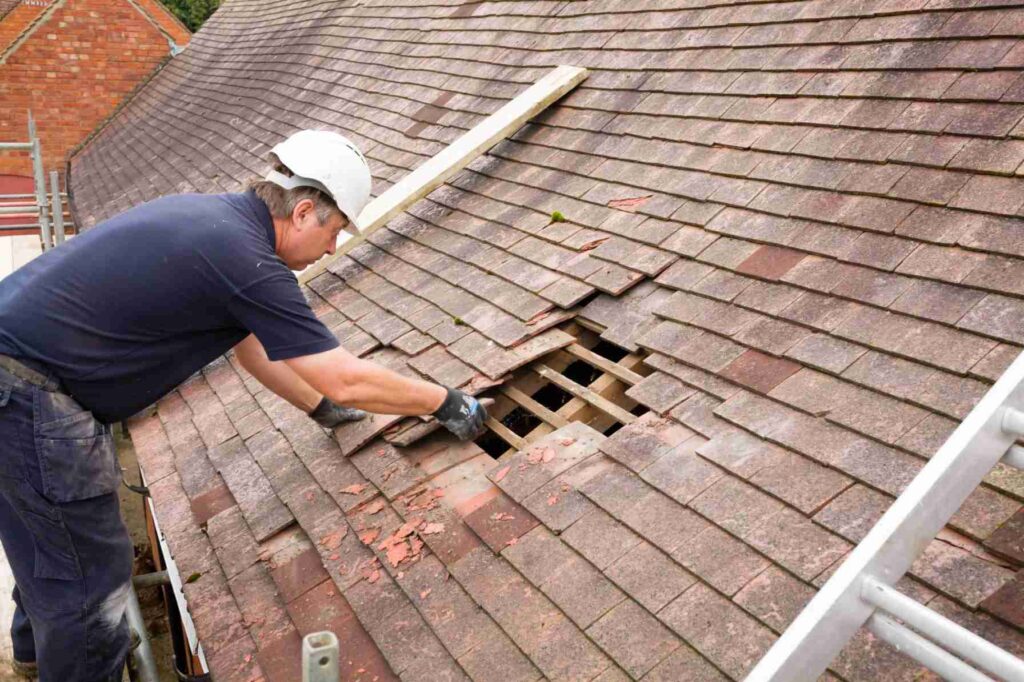 Roofers carrying out emergency roof repairs in Kildare during storm damage