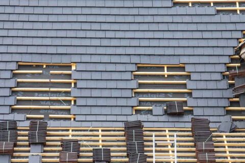 Professional slate roof installation on residential property in Kildare by roofing contractors