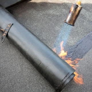 Flat roof torch on felt installation in Wicklow by professional roofing contractors